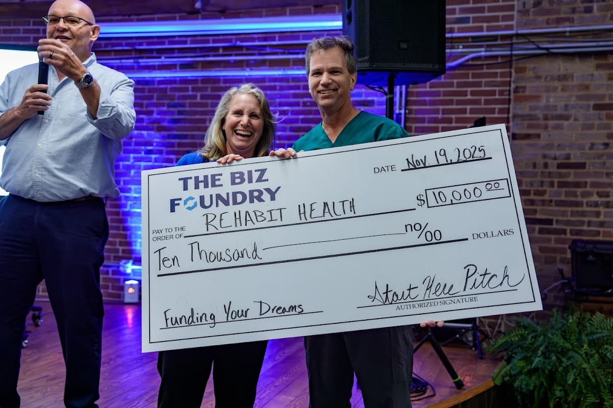Rehabit Health accepting a ten thousand dollar check at the 2025 Start Here Pitch Competition