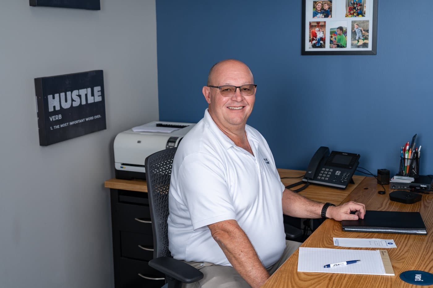 A member at his desk in a furnished private office