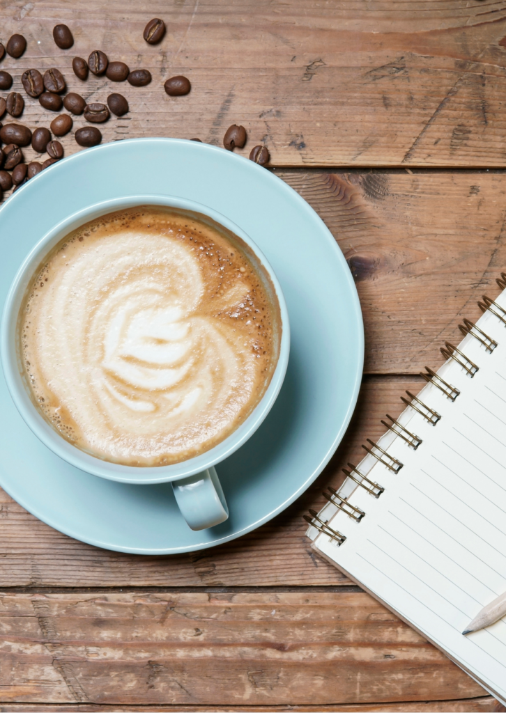 Coffee mug and a notebook