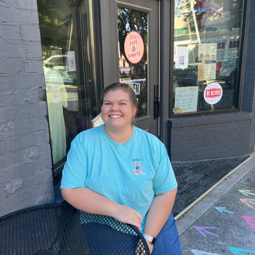 Jamie Lankford sitting in front of her store Jamie's Eats & Sweets in Cookeville TN