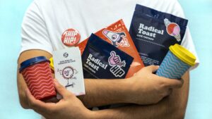 man holding a bunch of packages to show different brand identity